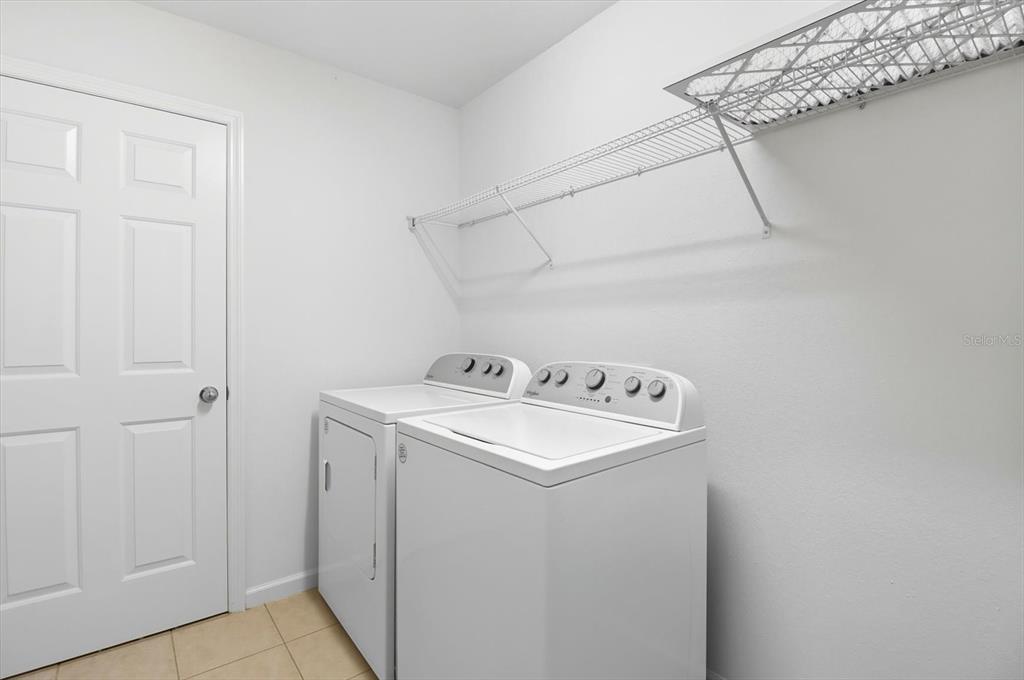 4059 Southwest 51st Road Ocala, FL 34474 - Photo 21 of 42 a utility room with dryer and washer