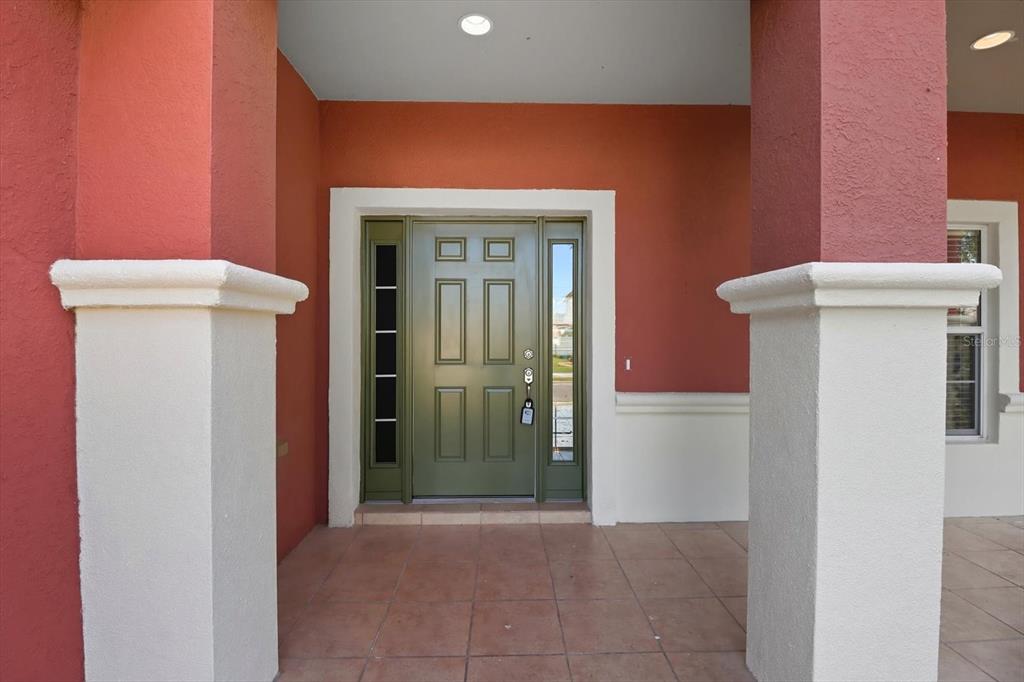 4059 Southwest 51st Road Ocala, FL 34474 - Photo 5 of 42 a view of a hallway with wooden shelves