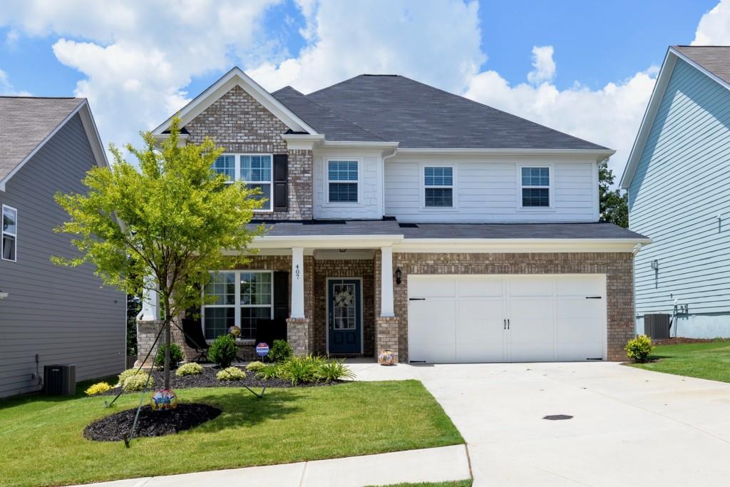 407 Timberleaf Road Canton, GA 30115 - Photo 1 of 1 Beautiful front view of the property.