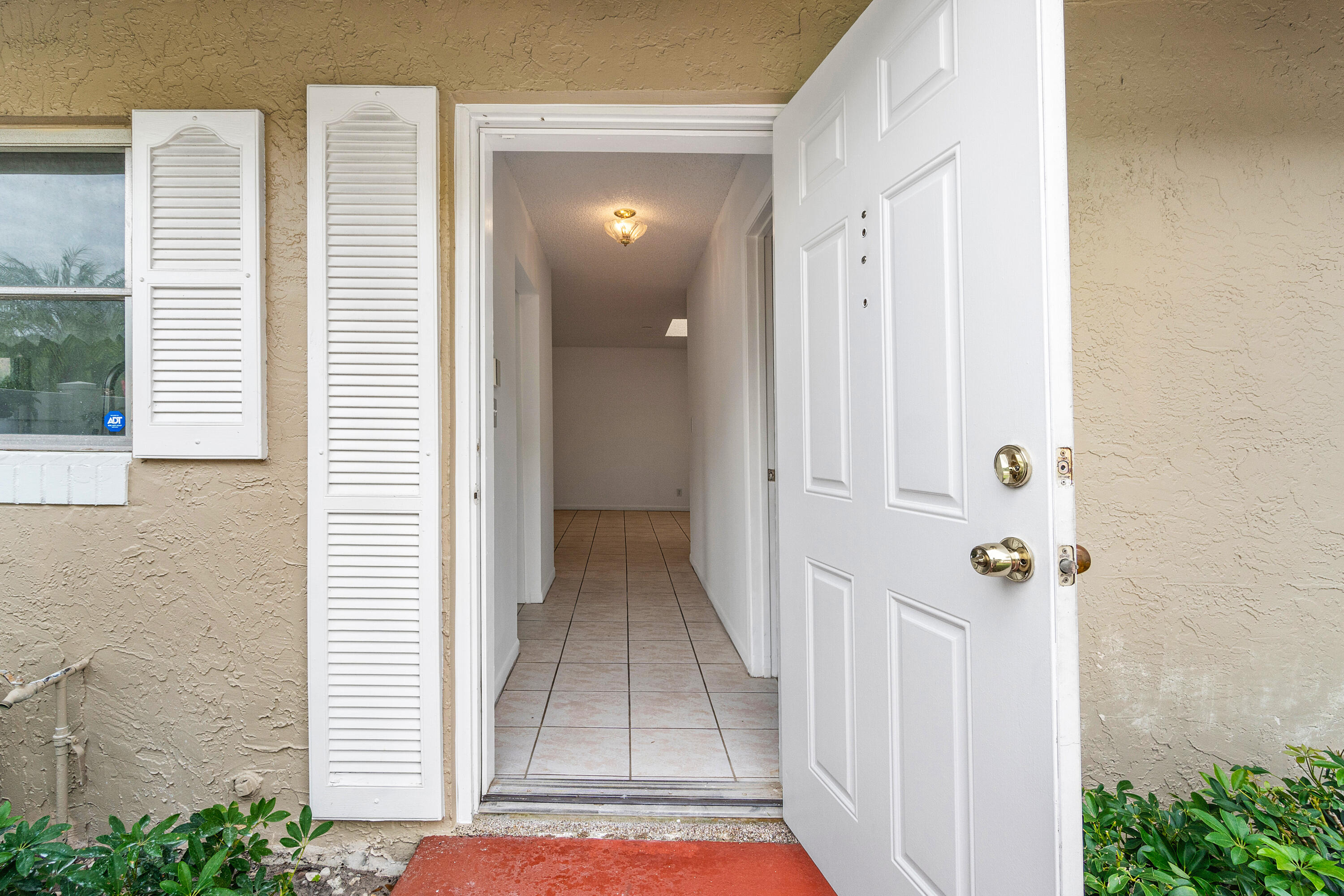 8736 Rheims Road Boca Raton, FL 33496 - Photo 3 of 37 004-8736RheimsRoad-BocaRaton-FL-33496-FU