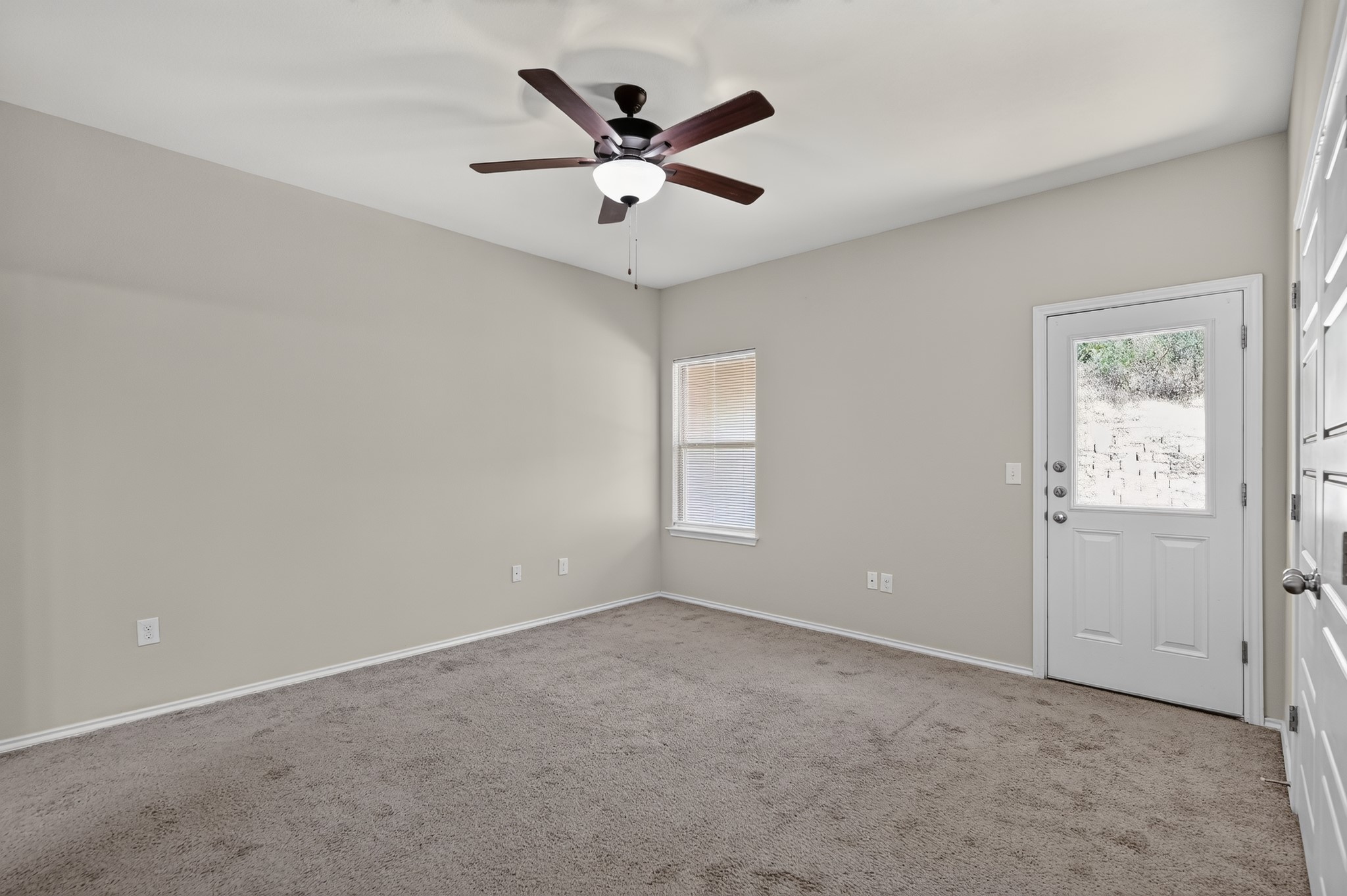 1733 Davidson Ranch Road Georgetown, TX 78626 - Photo 15 of 33 Soft carpeting pairs with neutral walls in this versatile, light-filled space.