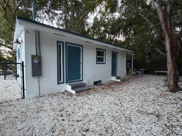 a backyard of a house with shower