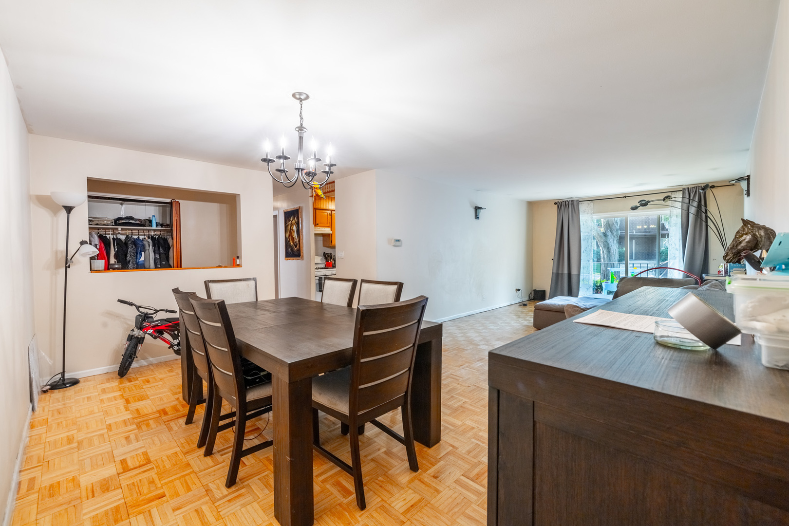 1525 Sander Court, Unit 103 Wheeling, IL 60090 - Photo 12 of 28 a view of a dining room with furniture and window