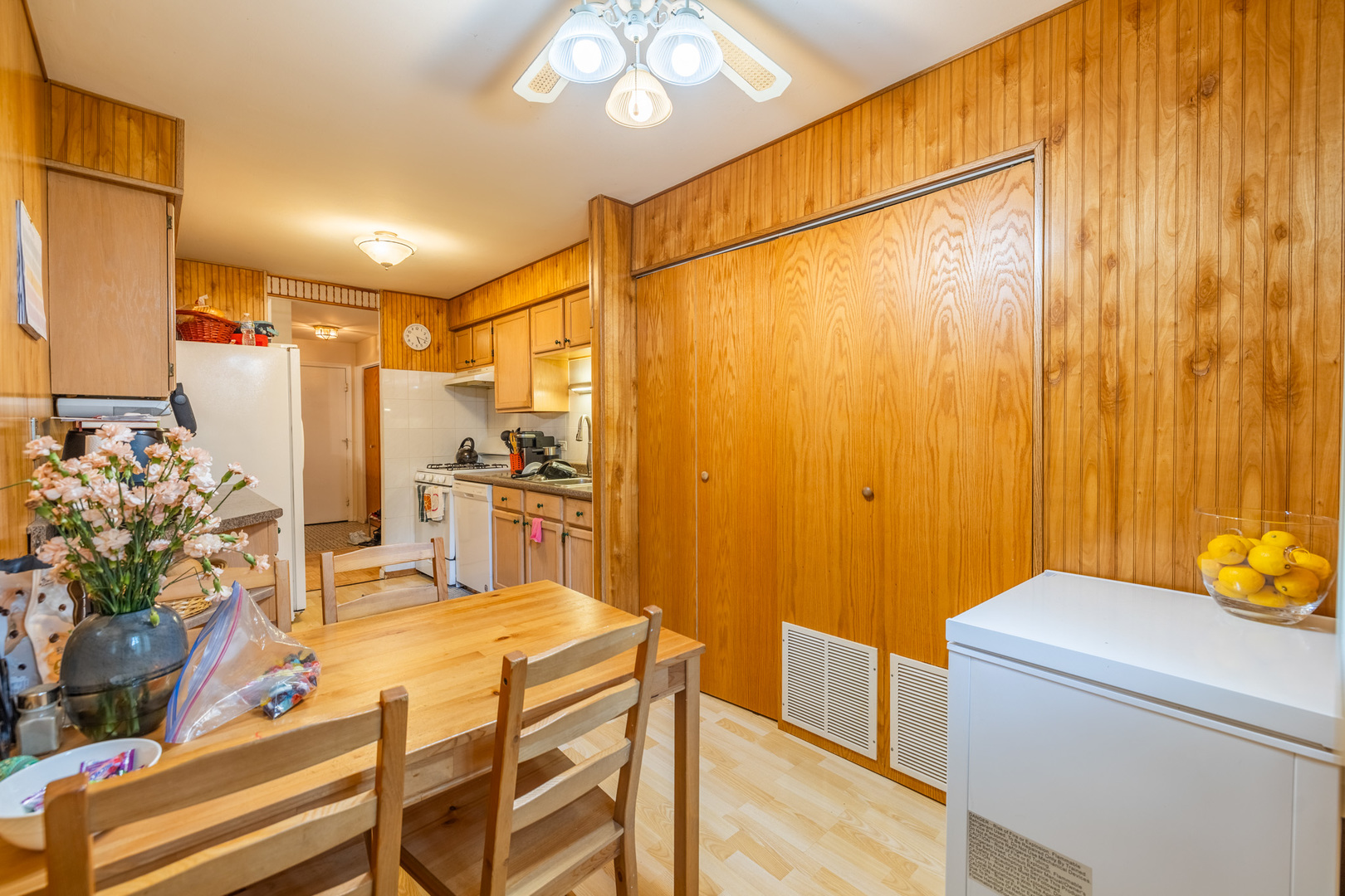 1525 Sander Court, Unit 103 Wheeling, IL 60090 - Photo 17 of 28 a bathroom with a sink and a refrigerator