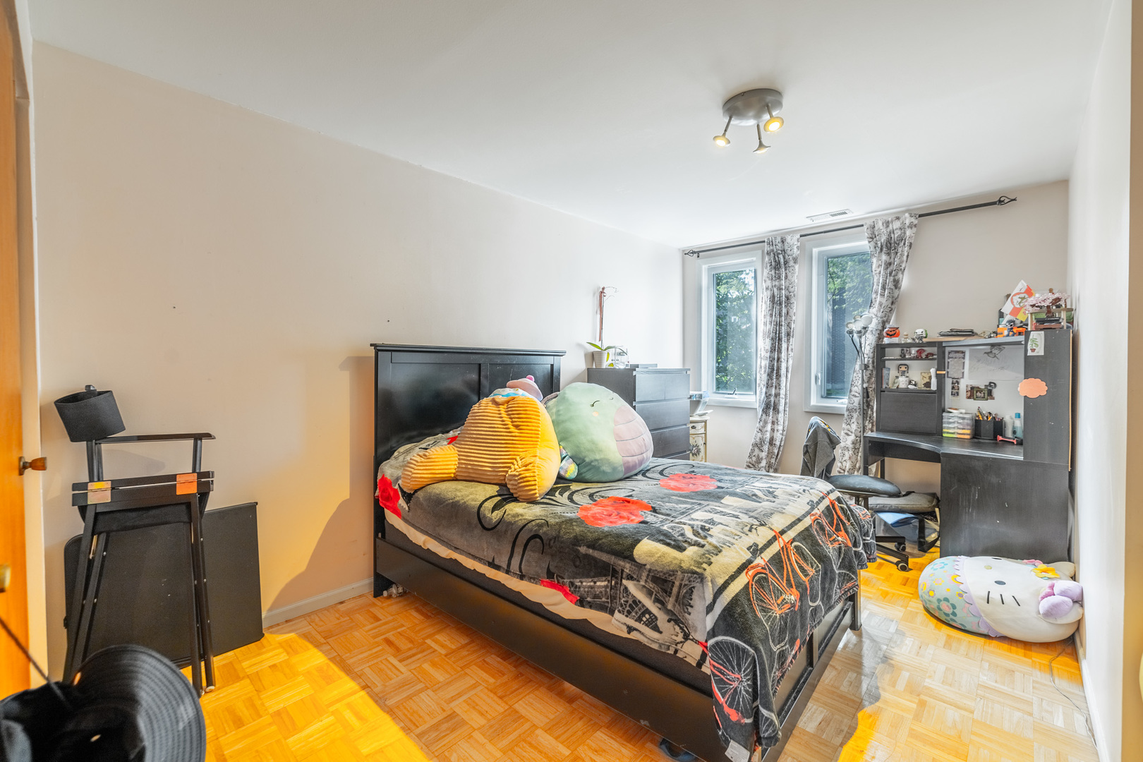 1525 Sander Court, Unit 103 Wheeling, IL 60090 - Photo 20 of 28 a bedroom with a bed and wooden floor