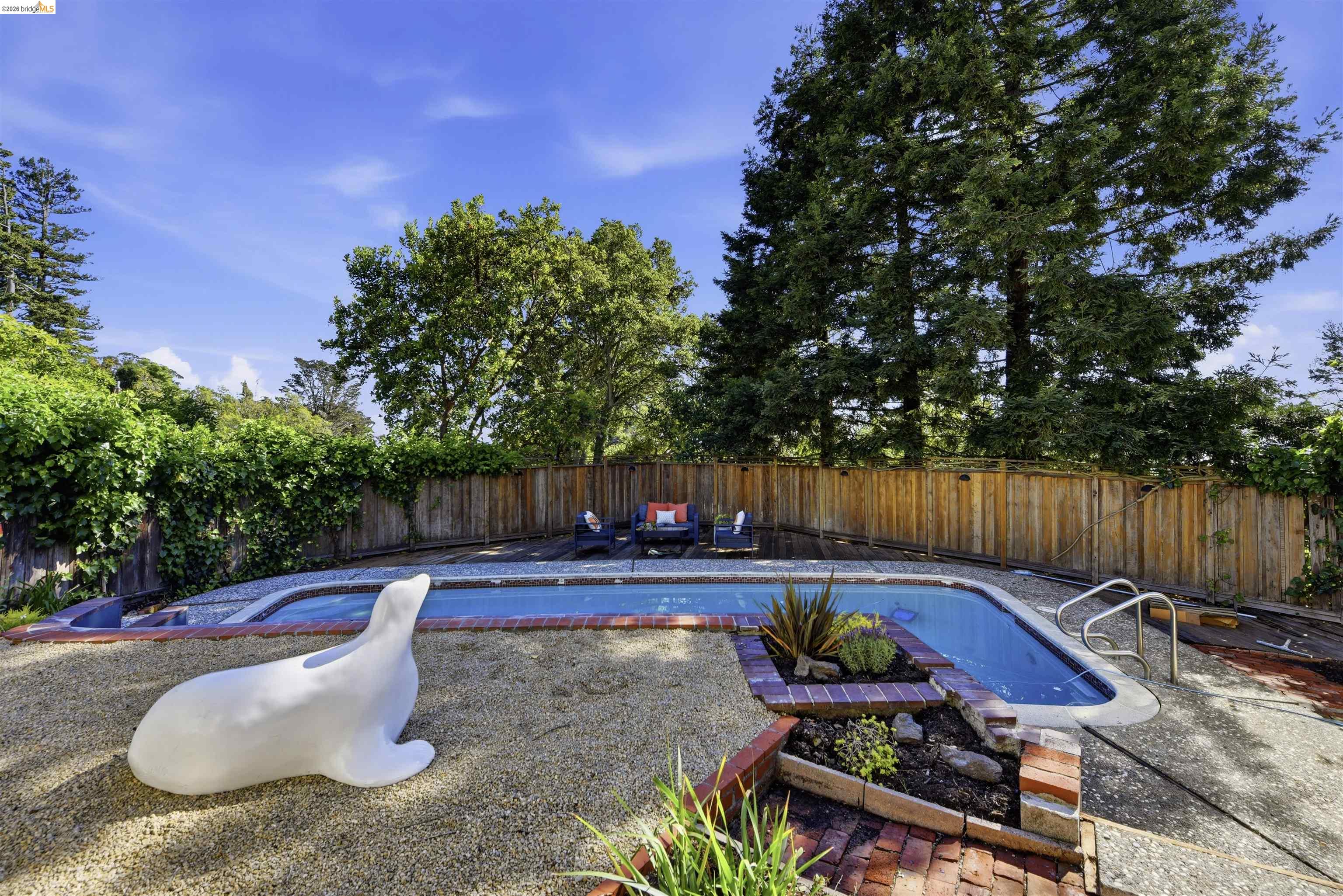 44 Highgate Road Kensington, CA 94707 - Photo 58 of 83 a view of a backyard with plants and outdoor seating