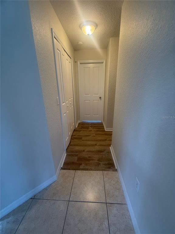 927 Reserve Place Davenport, FL 33896 - Photo 10 of 18 a view of a hallway