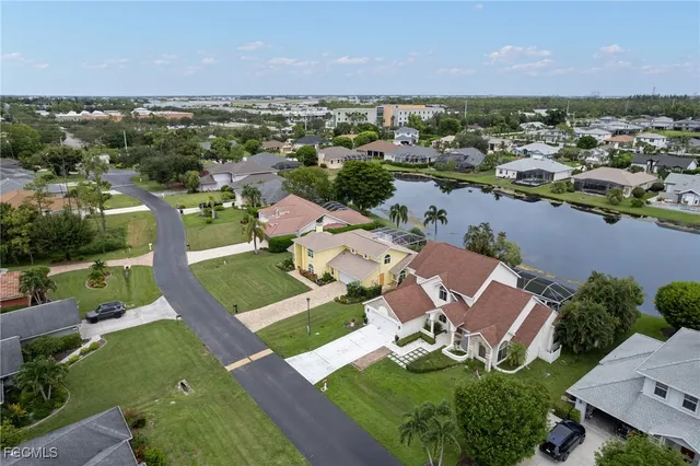 an aerial view of a house with a garden