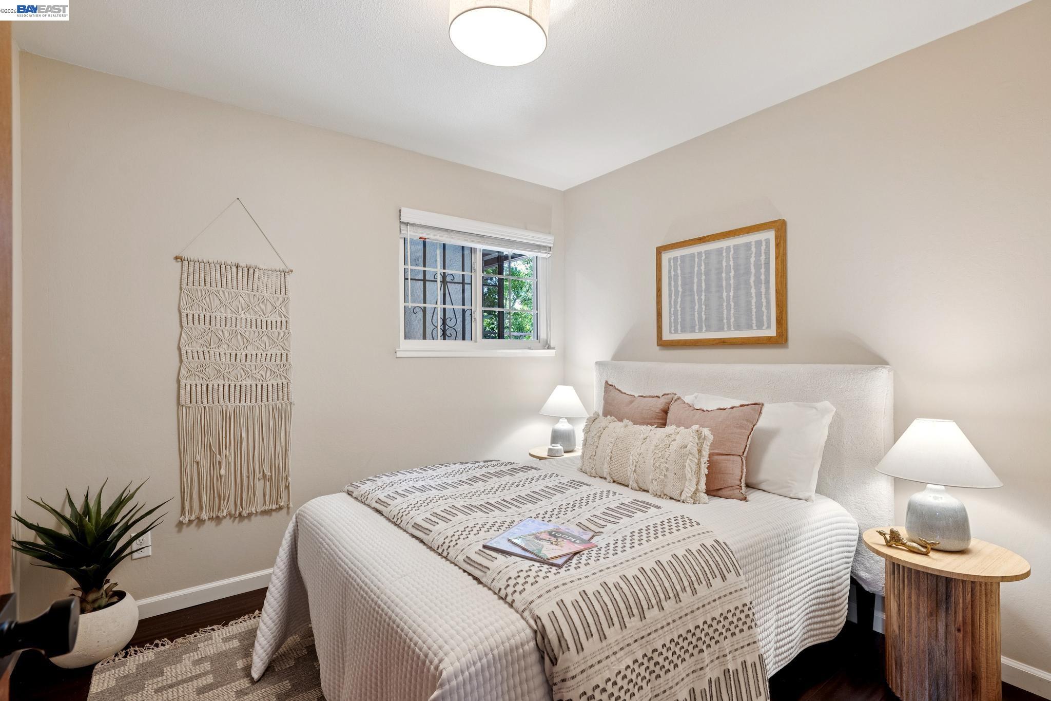328 Sand Beach Road Alameda, CA 94501 - Photo 31 of 48 a bedroom with a bed and a window