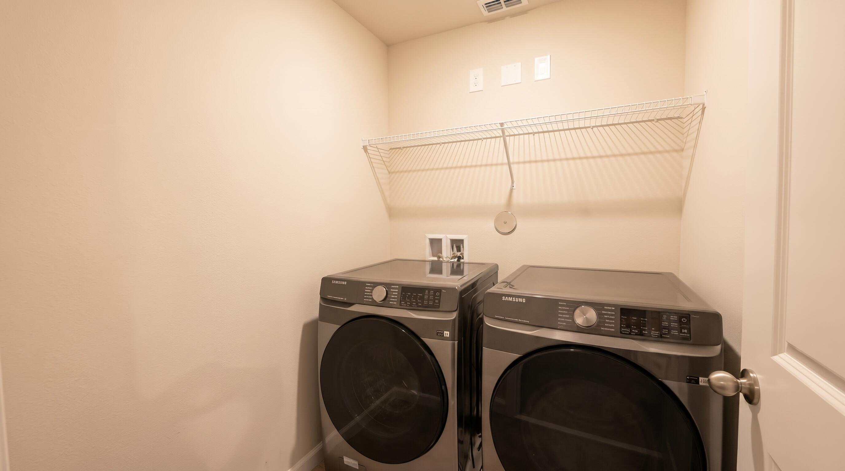 5784 Southeast Edgewater Circle Stuart, FL 34997 - Photo 18 of 33 a utility room with dryer and washer