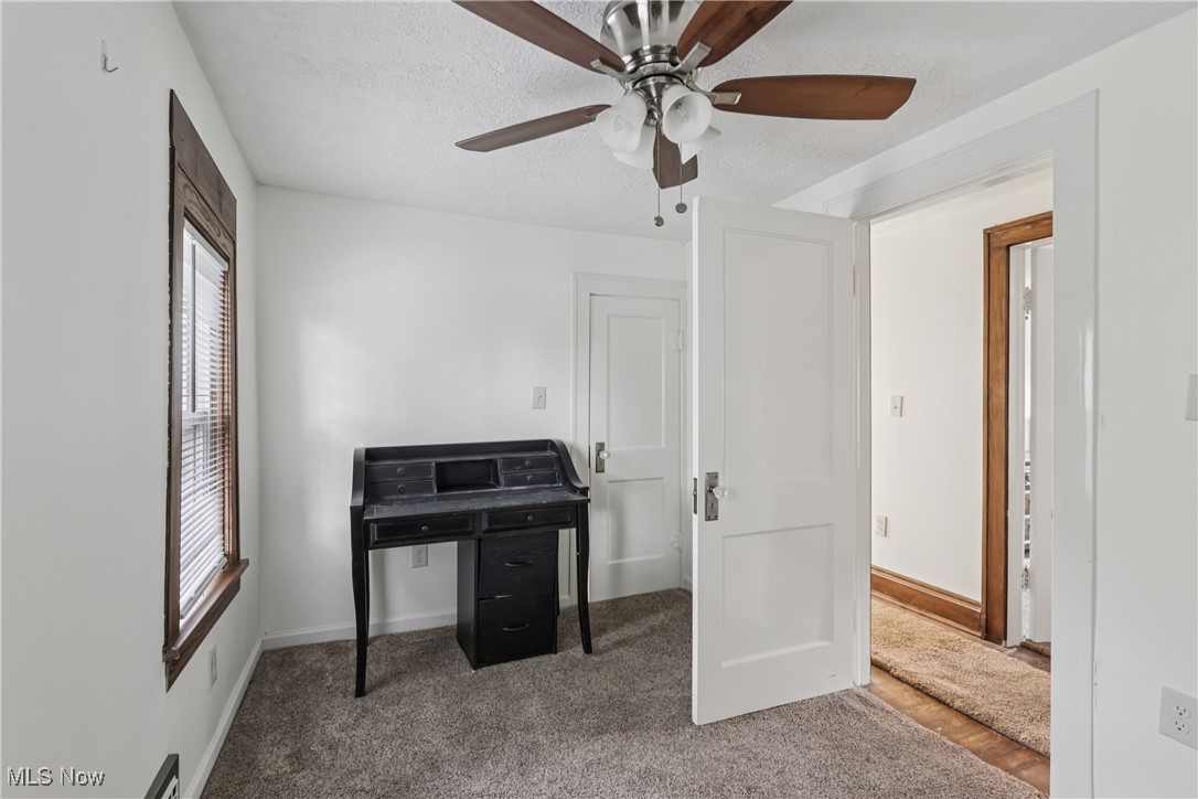 1674 Betz Road Akron, OH 44306 - Photo 21 of 29 Bedroom showing closet, ceiling fan / light and carpet flooring