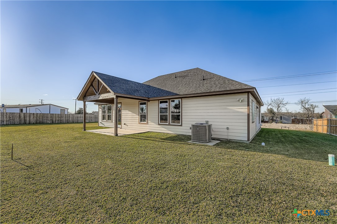 222 Arosa Drive Elgin, TX 78621 - Photo 6 of 40 a front view of a house with a yard