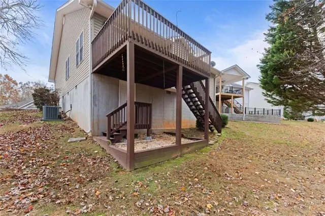 a view of a house with wooden stairs