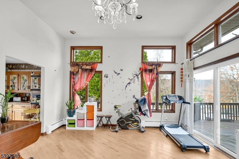 699 East Shore Road West Milford, NJ 07421 - Photo 12 of 50 a view of a room with gym equipment