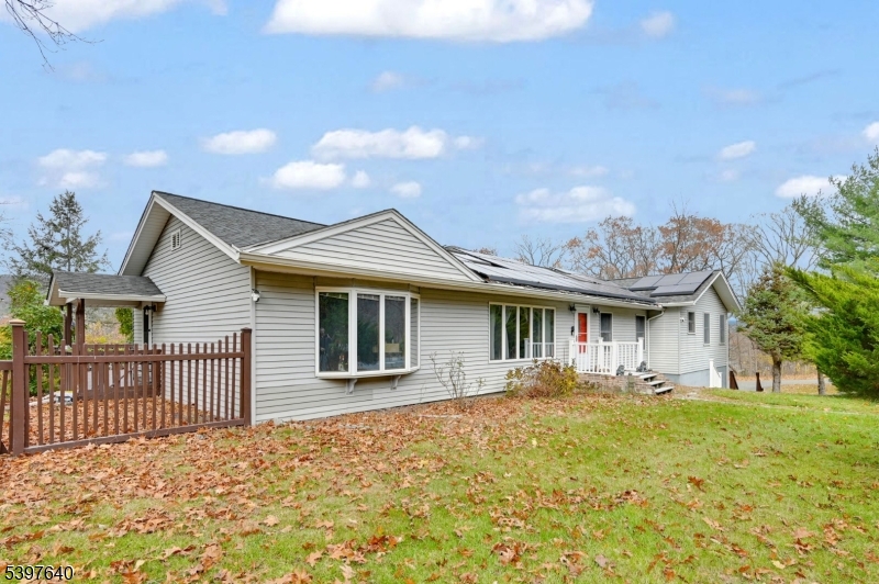 699 East Shore Road West Milford, NJ 07421 - Photo 2 of 50 a front view of a house with a yard