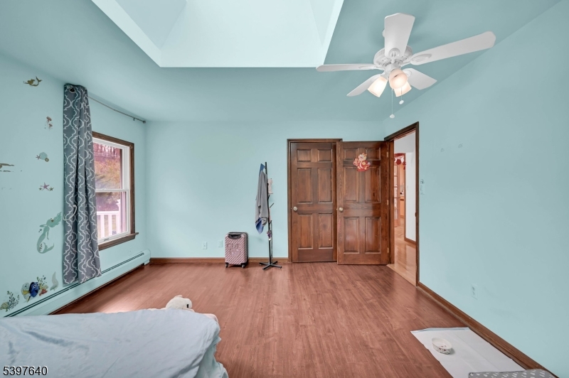 699 East Shore Road West Milford, NJ 07421 - Photo 31 of 50 a view of livingroom with hardwood floor and ceiling fan