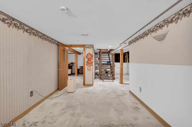 699 East Shore Road West Milford, NJ 07421 - Photo 36 of 50 a view of a livingroom with walk in closet and bedroom