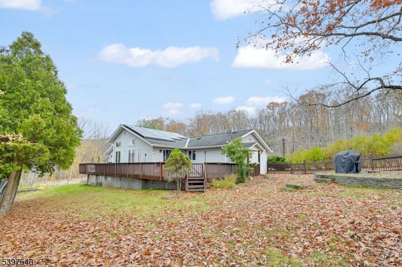 699 East Shore Road West Milford, NJ 07421 - Photo 42 of 50 a small house with a trees in the background