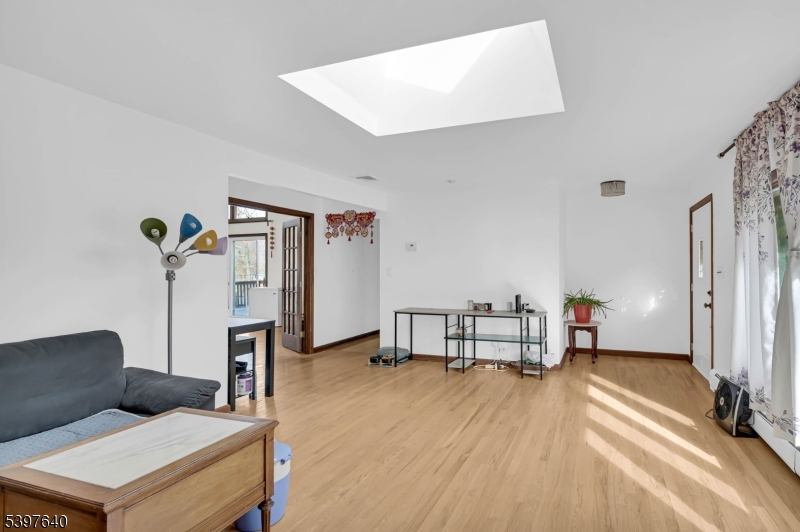 699 East Shore Road West Milford, NJ 07421 - Photo 6 of 50 a bedroom with furniture and a wooden floor