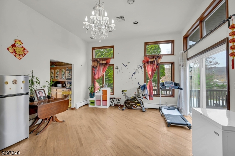 699 East Shore Road West Milford, NJ 07421 - Photo 10 of 50 a view of a room with gym equipment