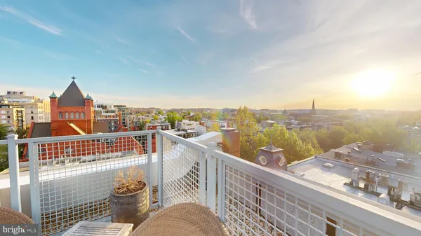 a view of a terrace with furniture