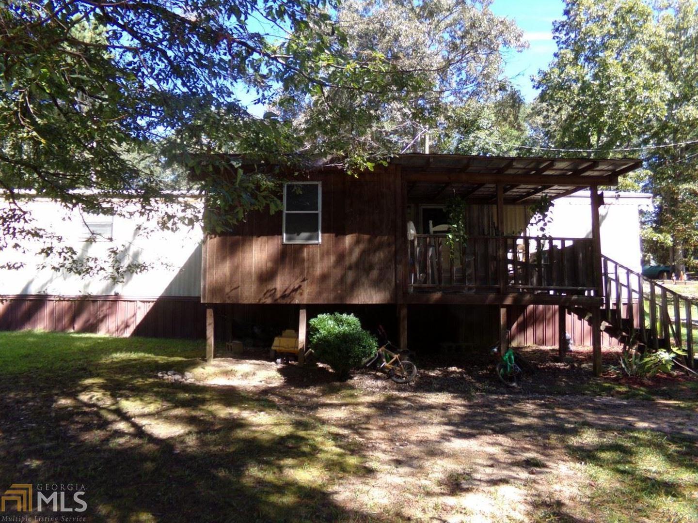 4934 Carder Mill Road Gainesville, GA 30506 - Photo 1 of 1 a front view of a house with a yard