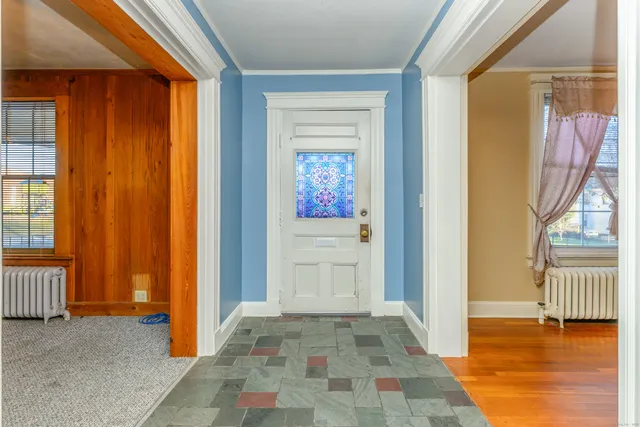 a view of front door with dining area