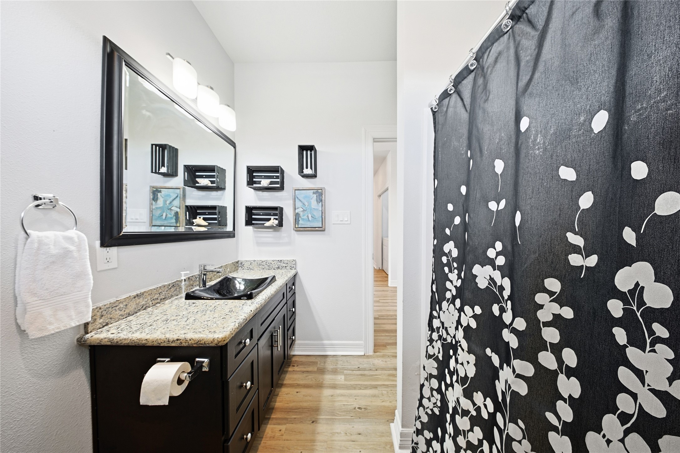 4414 Palm Street Freeport, TX 77541 - Photo 18 of 35 a kitchen with stainless steel appliances granite countertop a stove a refrigerator and a dining table
