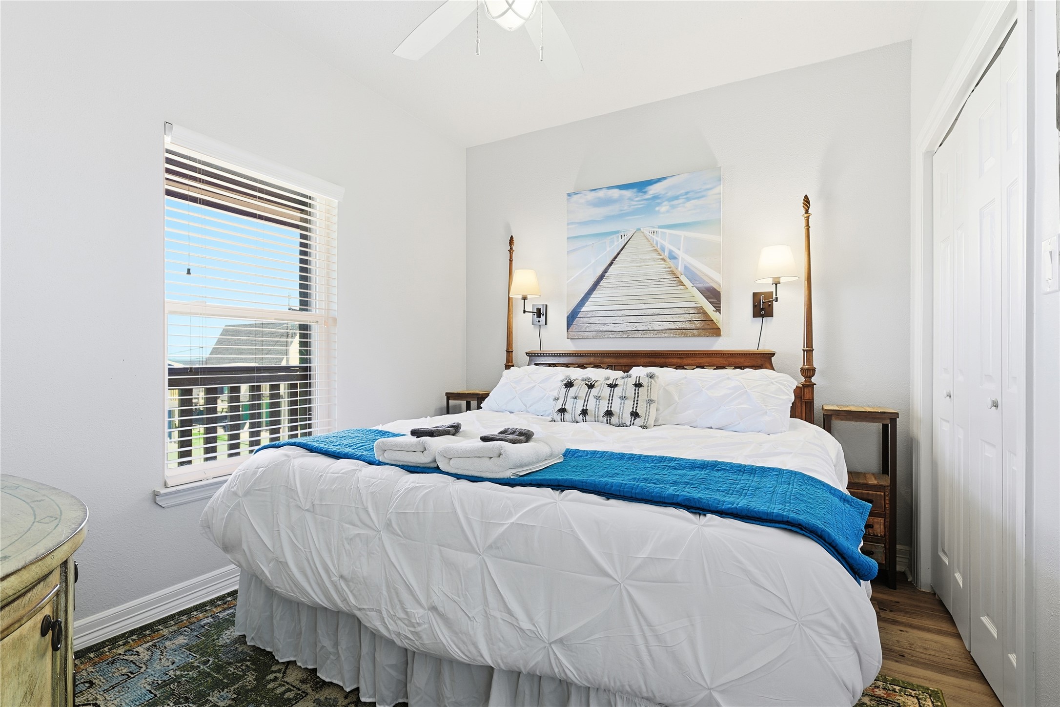 4414 Palm Street Freeport, TX 77541 - Photo 21 of 35 a bedroom with a bed and a window