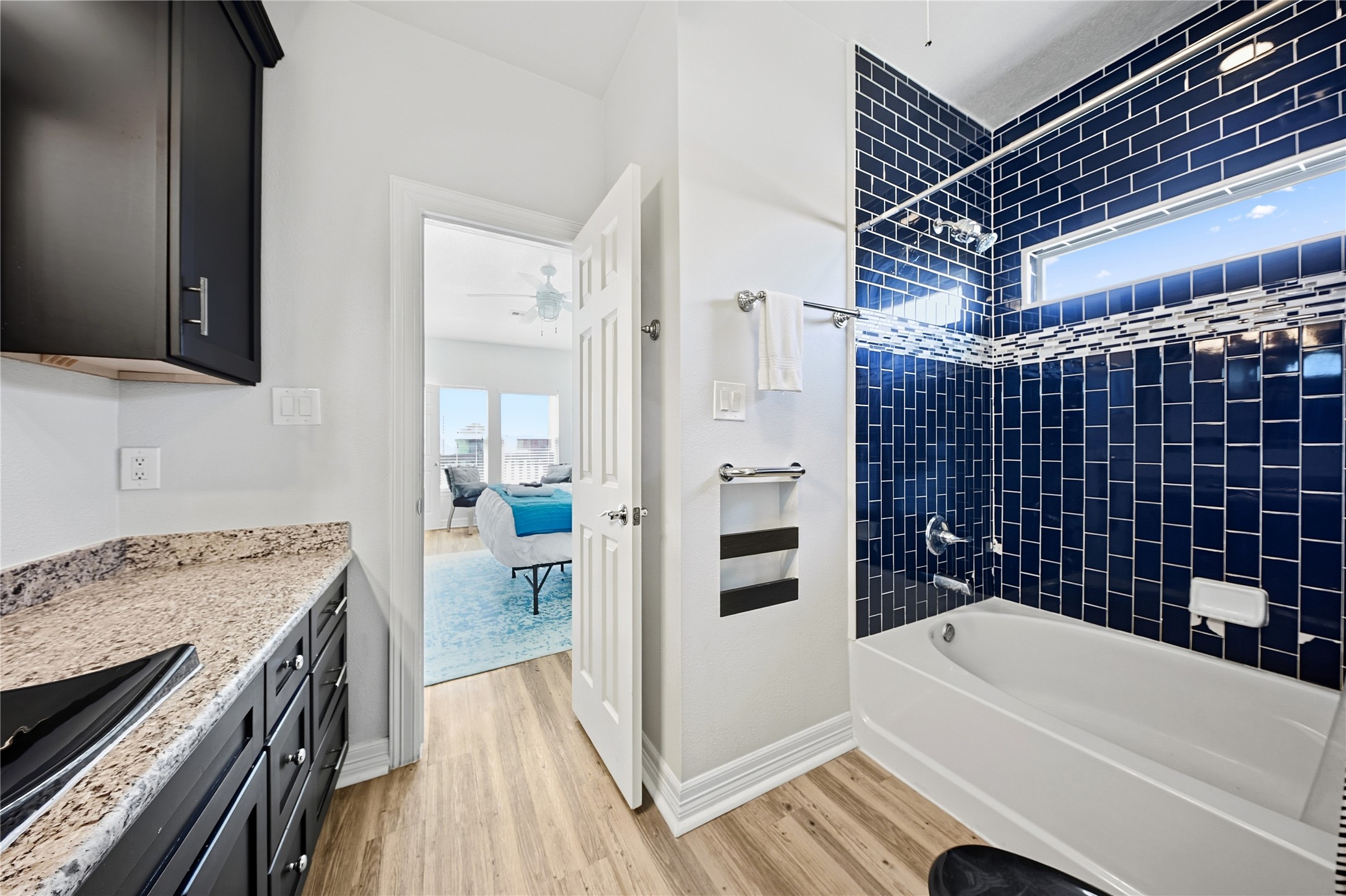 4414 Palm Street Freeport, TX 77541 - Photo 23 of 35 a bathroom with a bathtub and a sink