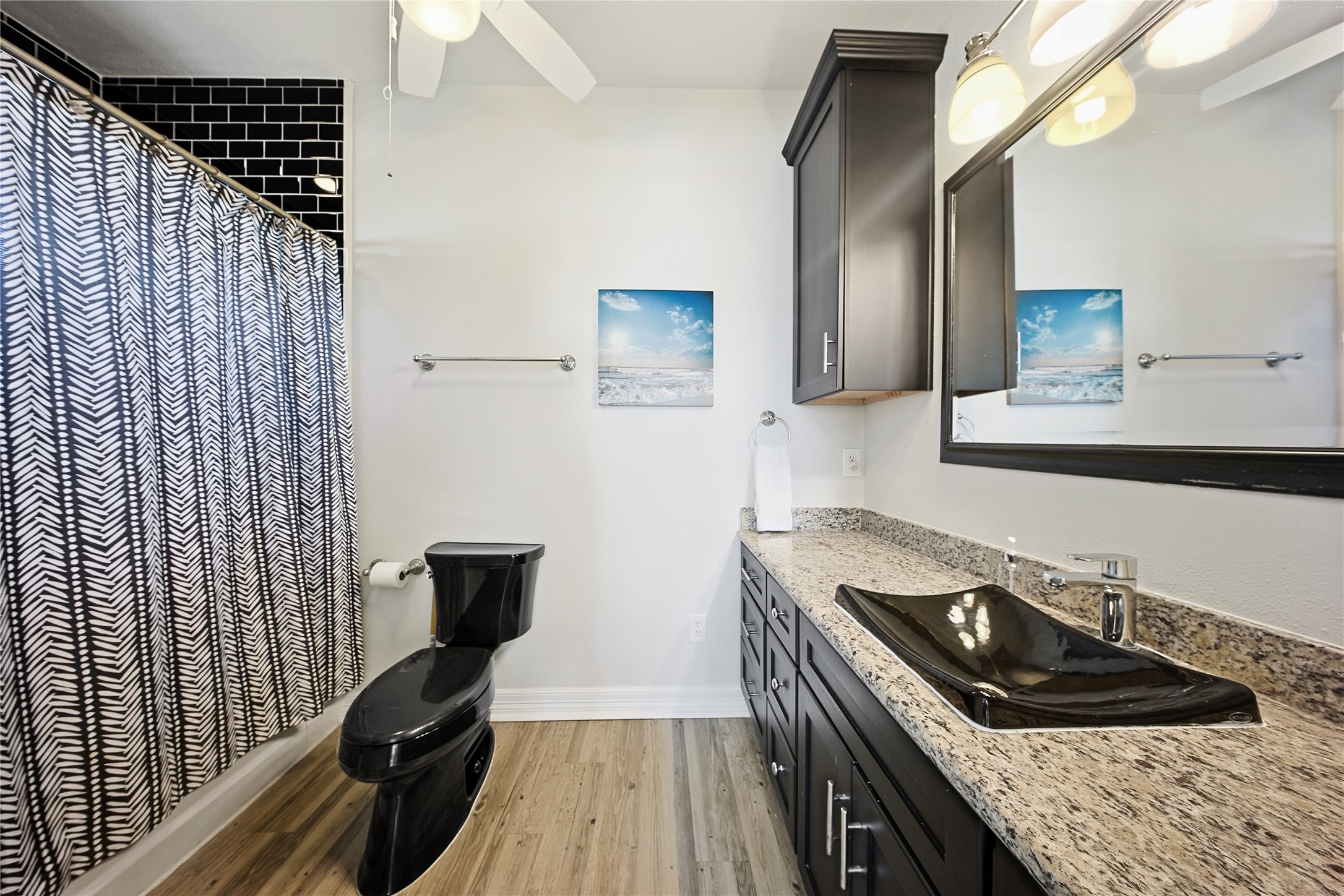 4414 Palm Street Freeport, TX 77541 - Photo 24 of 35 a kitchen with a sink stove and cabinets