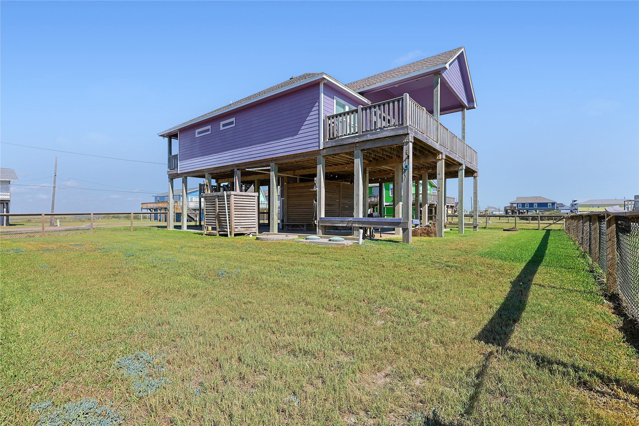 4414 Palm Street Freeport, TX 77541 - Photo 28 of 35 a view of a house with a yard and sitting area