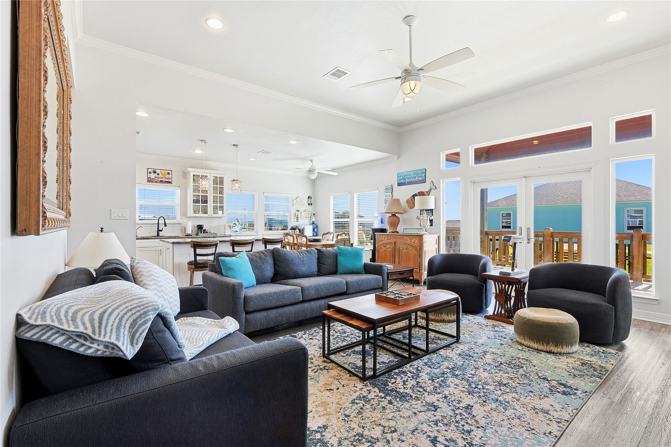 4414 Palm Street Freeport, TX 77541 - Photo 5 of 35 a living room with furniture ceiling fan and a rug