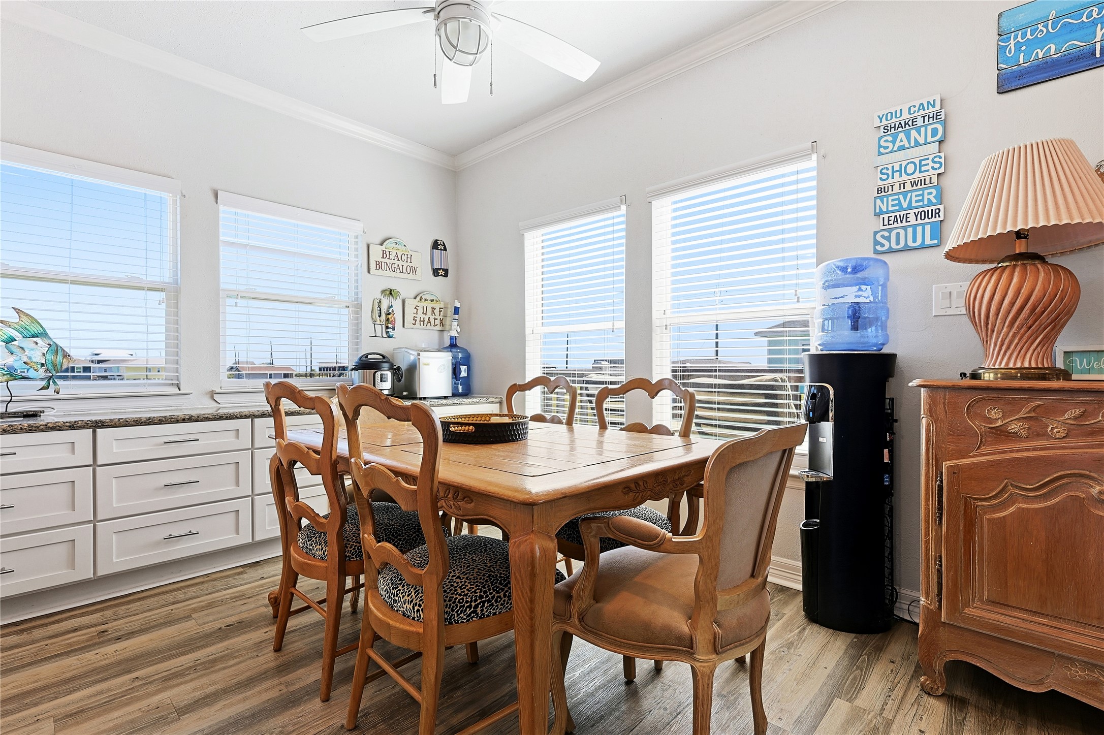 4414 Palm Street Freeport, TX 77541 - Photo 10 of 35 a view of a dining room with furniture and wooden floor