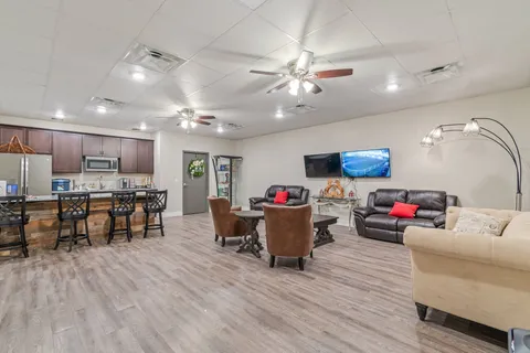 a view of a livingroom with a furniture