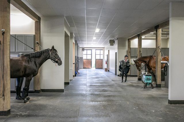 a view of a kitchen with sink and cabinets