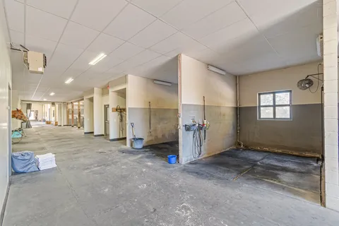 a water heater and wooden floor