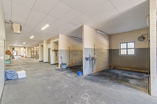 a water heater and wooden floor