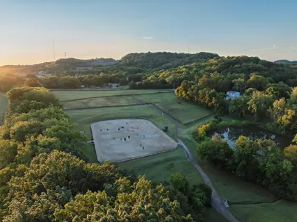 an aerial view of a house with a garden