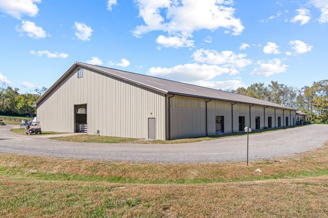 a backyard of a house with garage