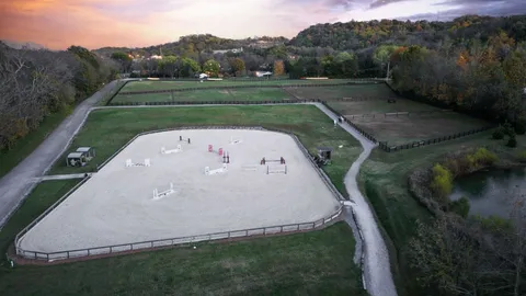 an aerial view of a golf course with a garden
