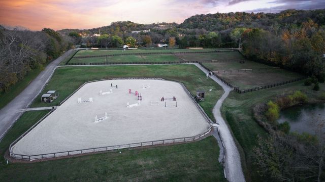an aerial view of a golf course with a garden