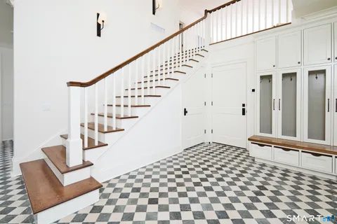 a view of entryway with a front door