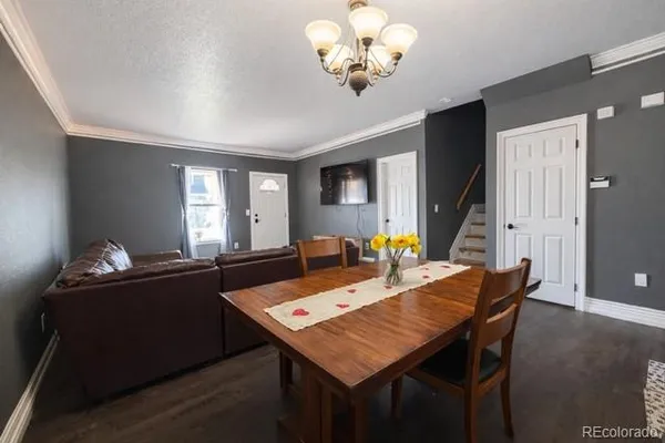 a view of a dining room with furniture