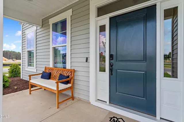 a large kitchen with stainless steel appliances lots of counter space and a sink