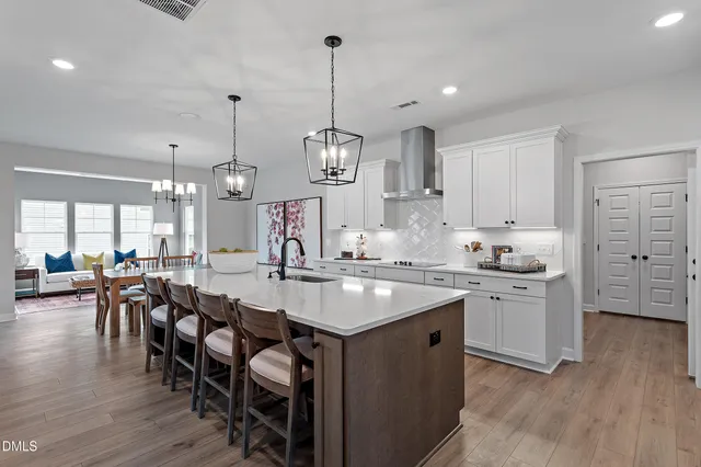 a bathroom with a sink double vanity and a mirror