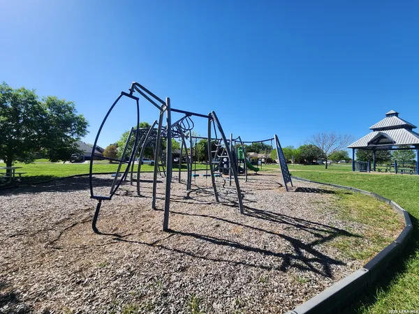 a view of a park with swings