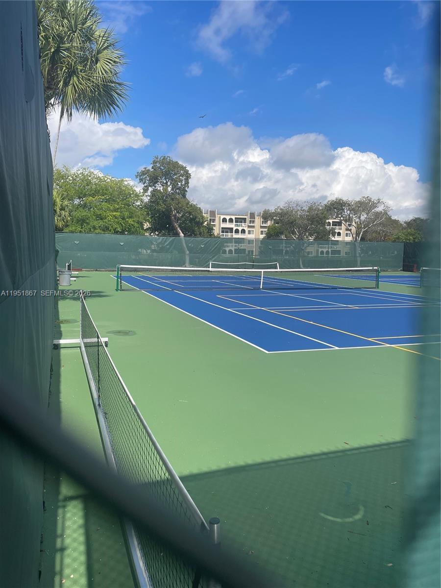 7785 Southwest 86th Street, Unit E123 Miami, FL 33143 - Photo 7 of 8 a view of an indoor swimming pool