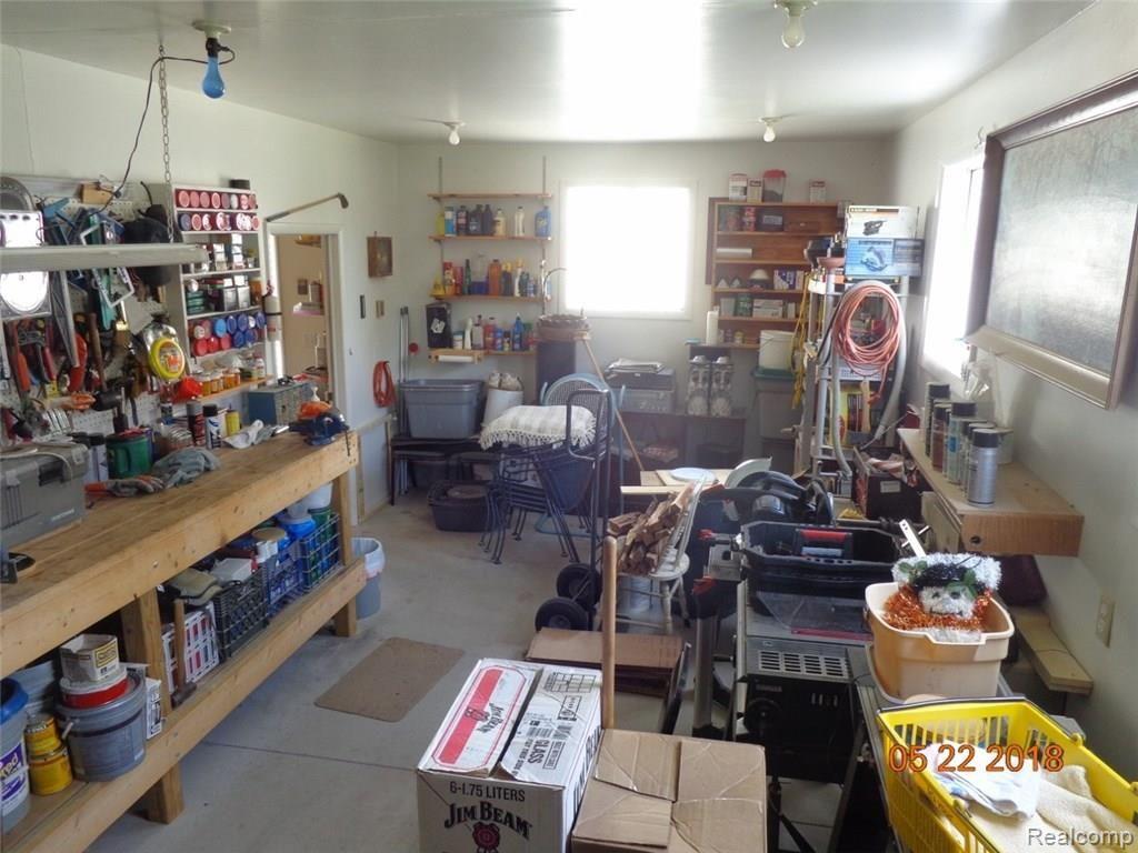 14015 Mar-Ral Road Alpena, MI 49707 - Photo 40 of 45 Garage interior, rear workshop