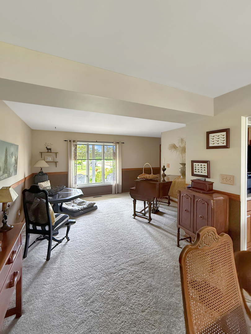 49W972 Peterson Road Maple Park, IL 60151 - Photo 12 of 38 a living room with furniture and a window